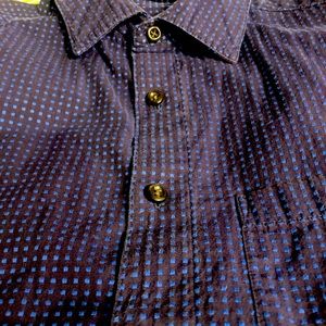 Dark blue long sleeve shirt with light blue dots.